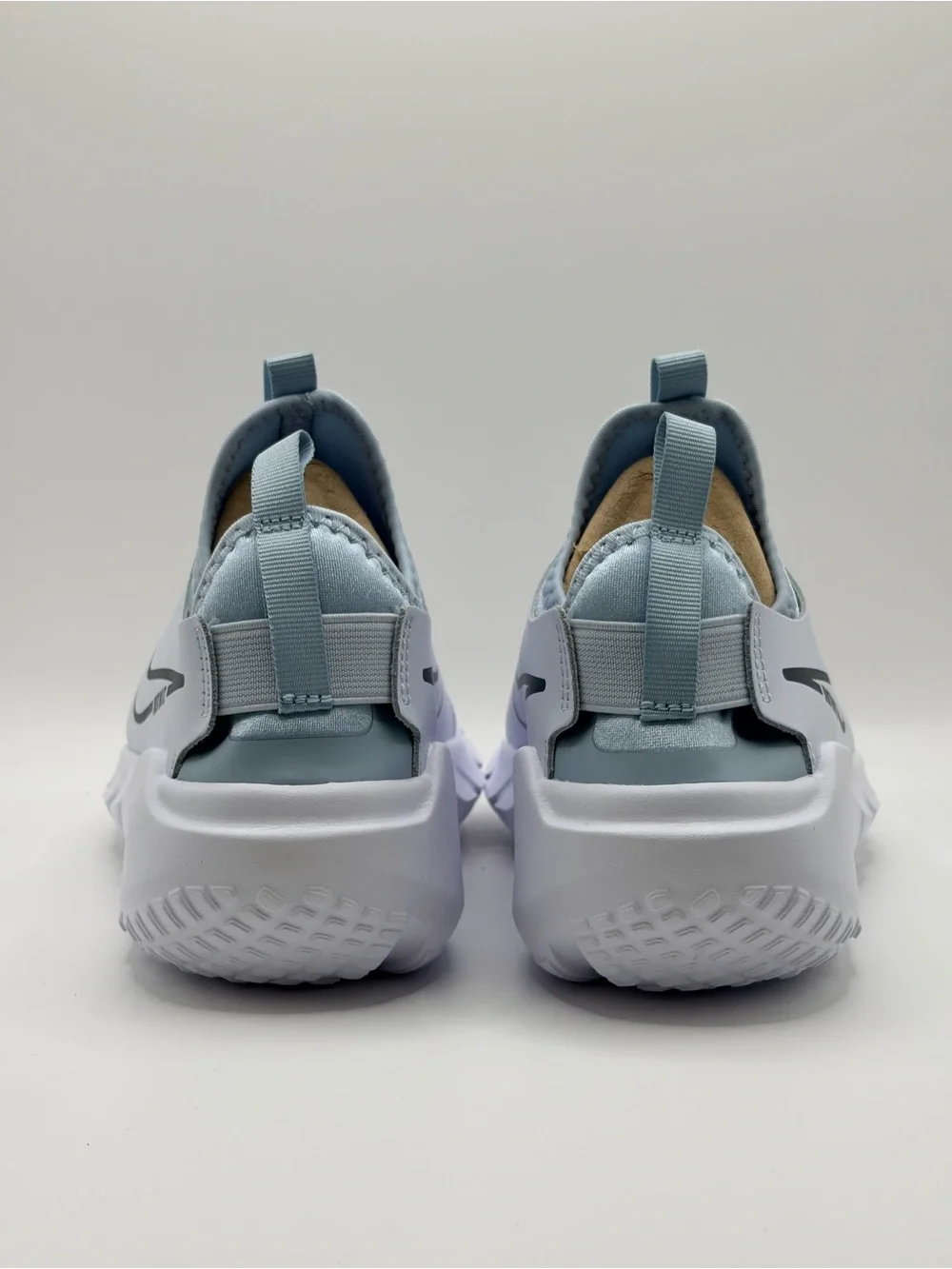 Nike 6Y/7.5W Light Blue and White Slip-On Sneakers with Navy Swoosh